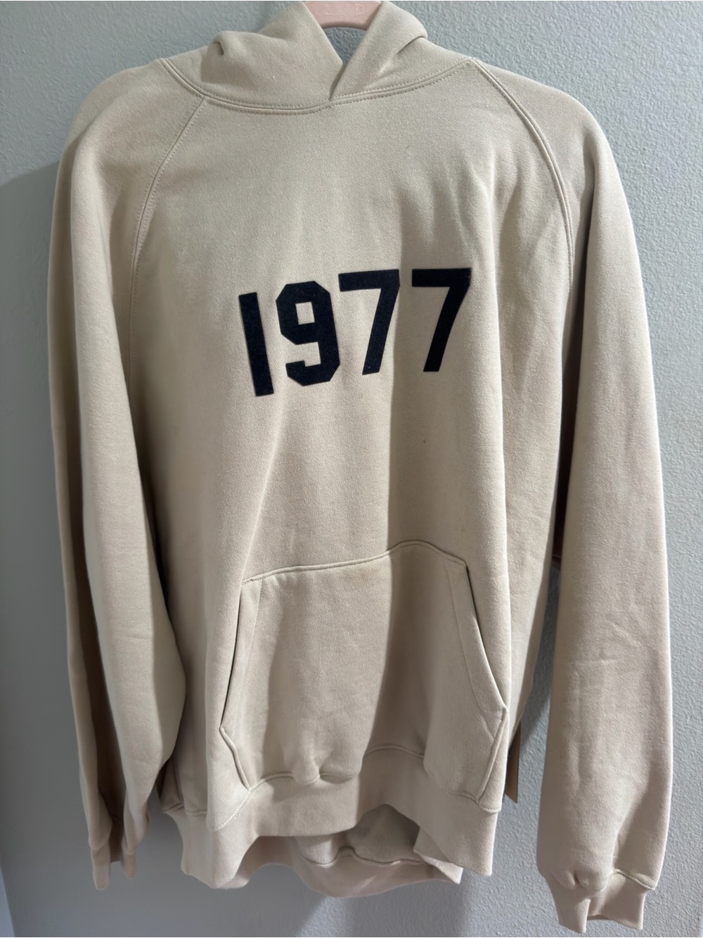 Essentials Men's Hoodie Sweatshirt in Cream with Black '1977'